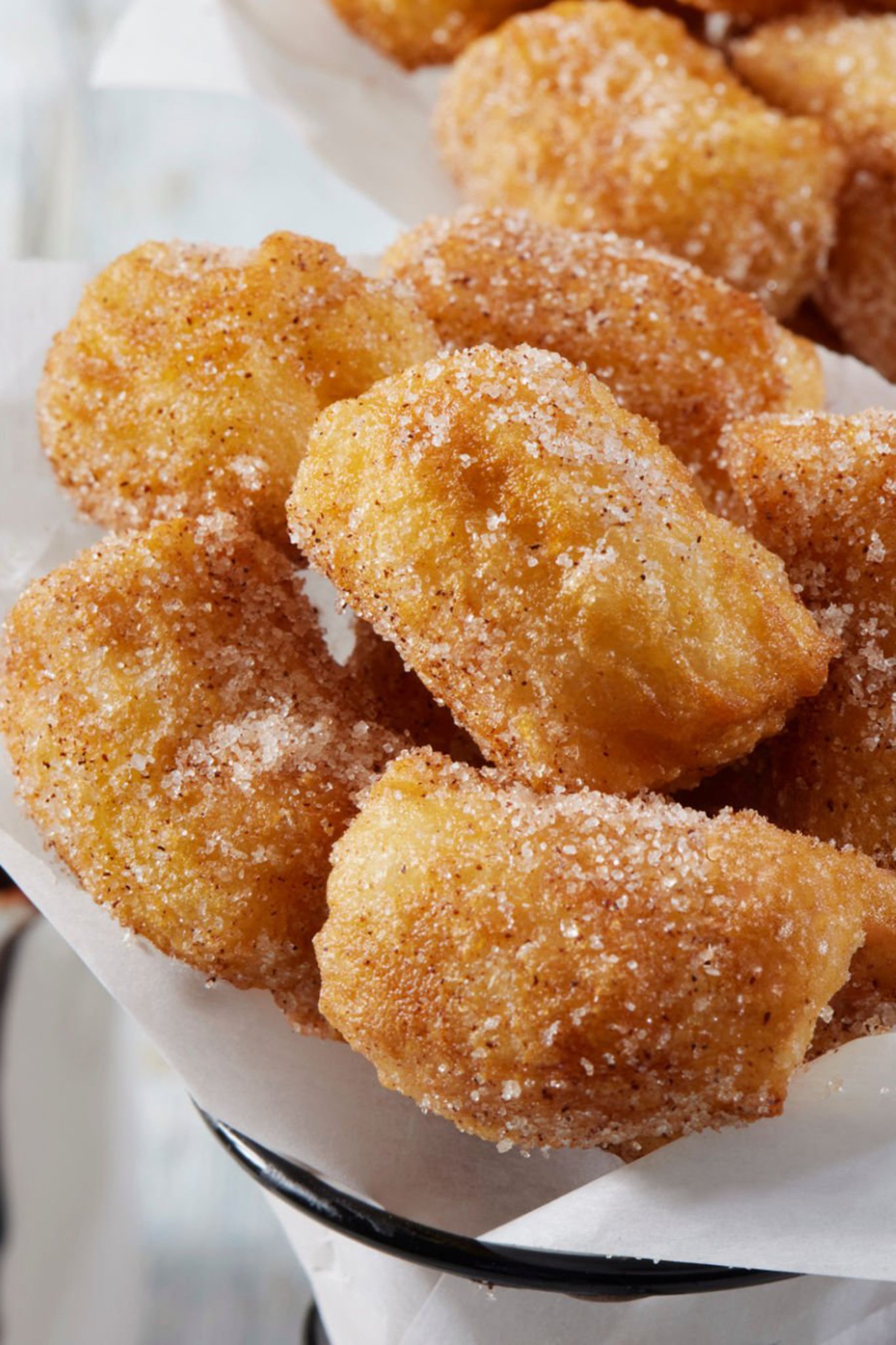 Elote on a stick with cheese, lime, and chili