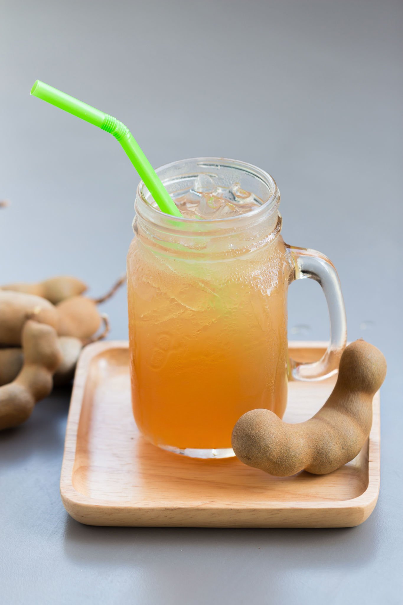 Elote on a stick with cheese, lime, and chili