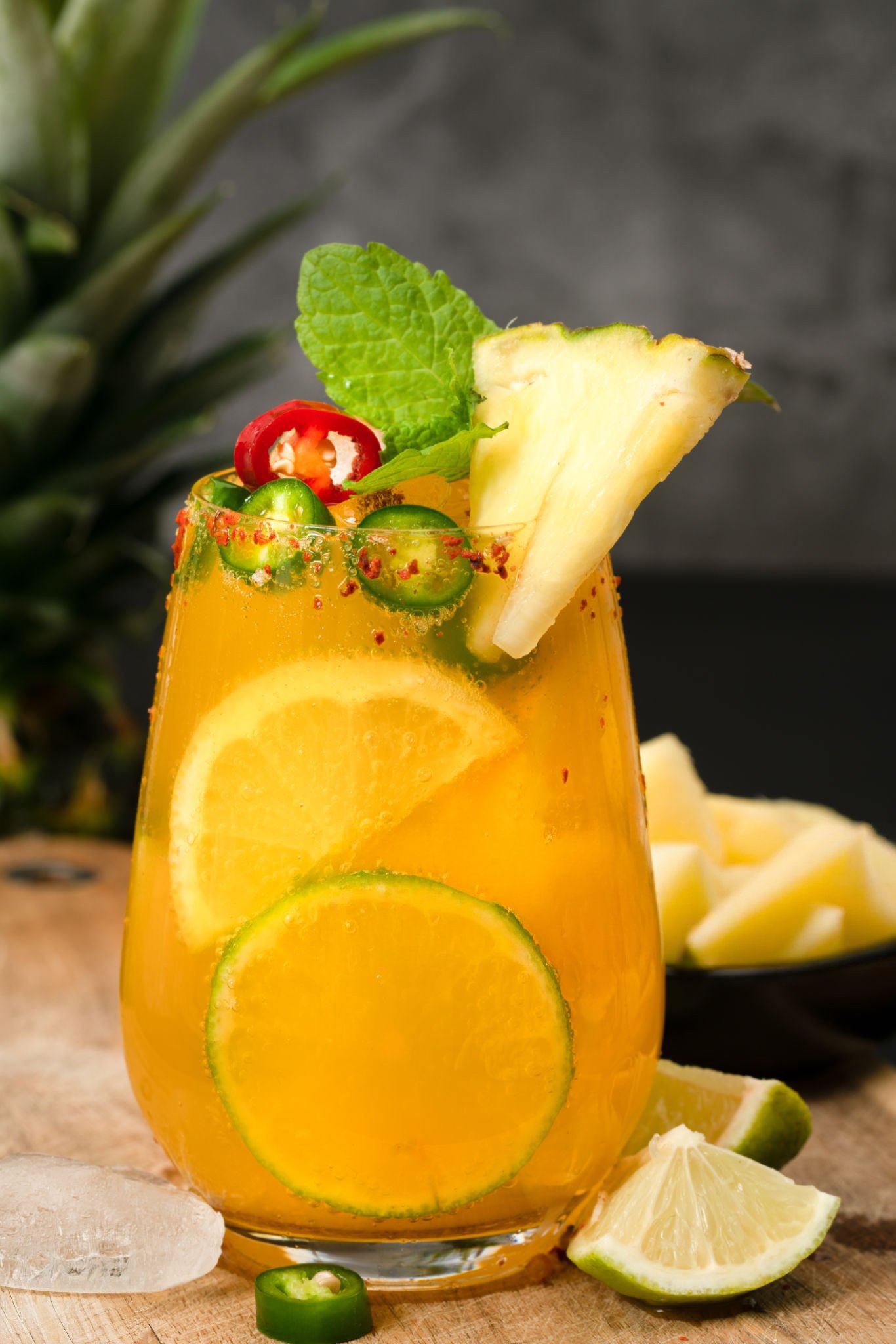 Elote on a stick with cheese, lime, and chili